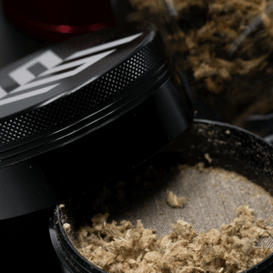 ground cannabis flower in a grinder for thca vs delta 9 blog