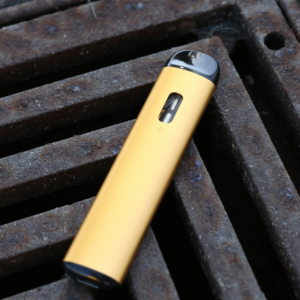 gold vape with black top