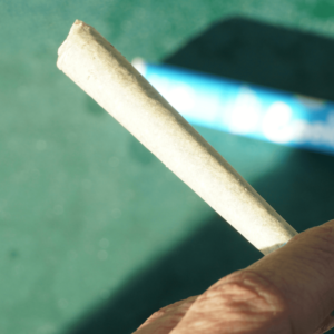 person holding an unlet joint