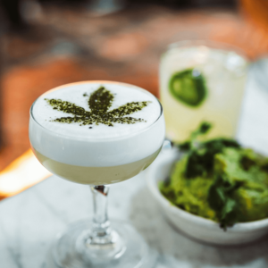 green cannabis drink with cannabis leaf design