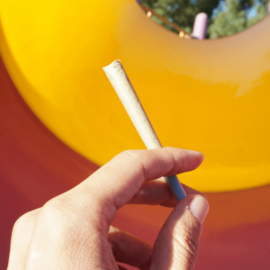 person holding hemp joint