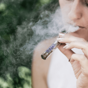 a girl smoking a one-hitter