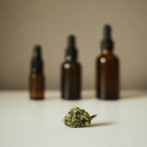 cannabis bud and tincture bottles
