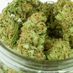 glass jar of bright green cannabis flower