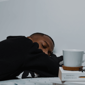 person sleeping on desk