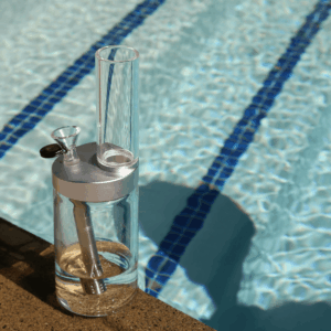 bong sitting on side of pool